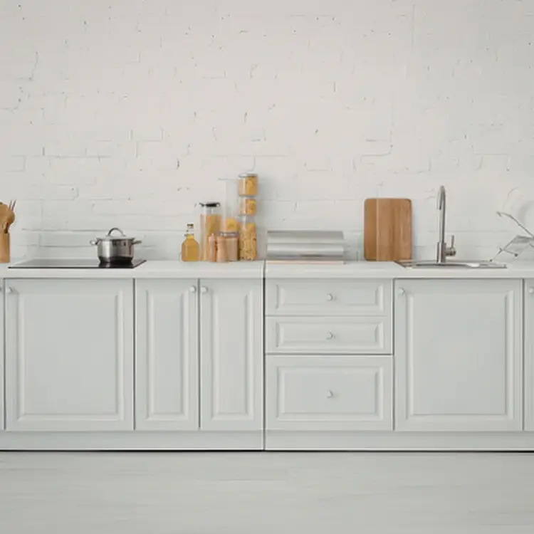 Built-in storage and cupboards upgraded with furniture wrapping in a clean modern interior