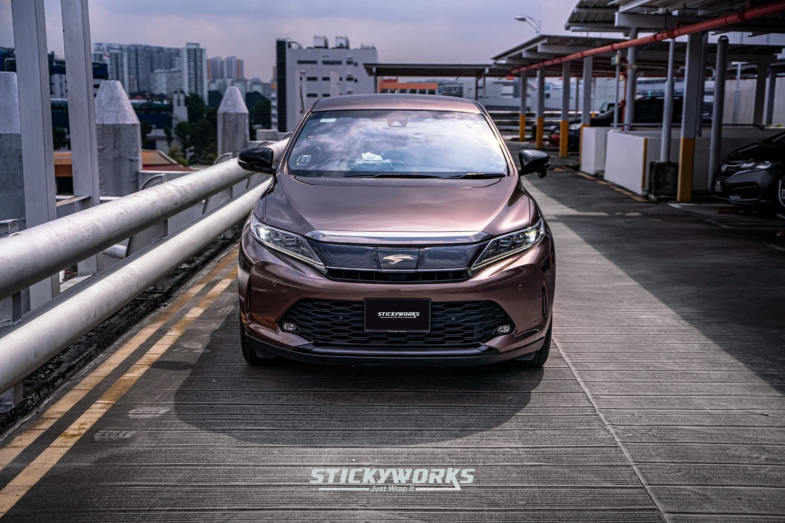 StickyWorks Toyota Harrier side profile with premium car wrap finish and modern styling