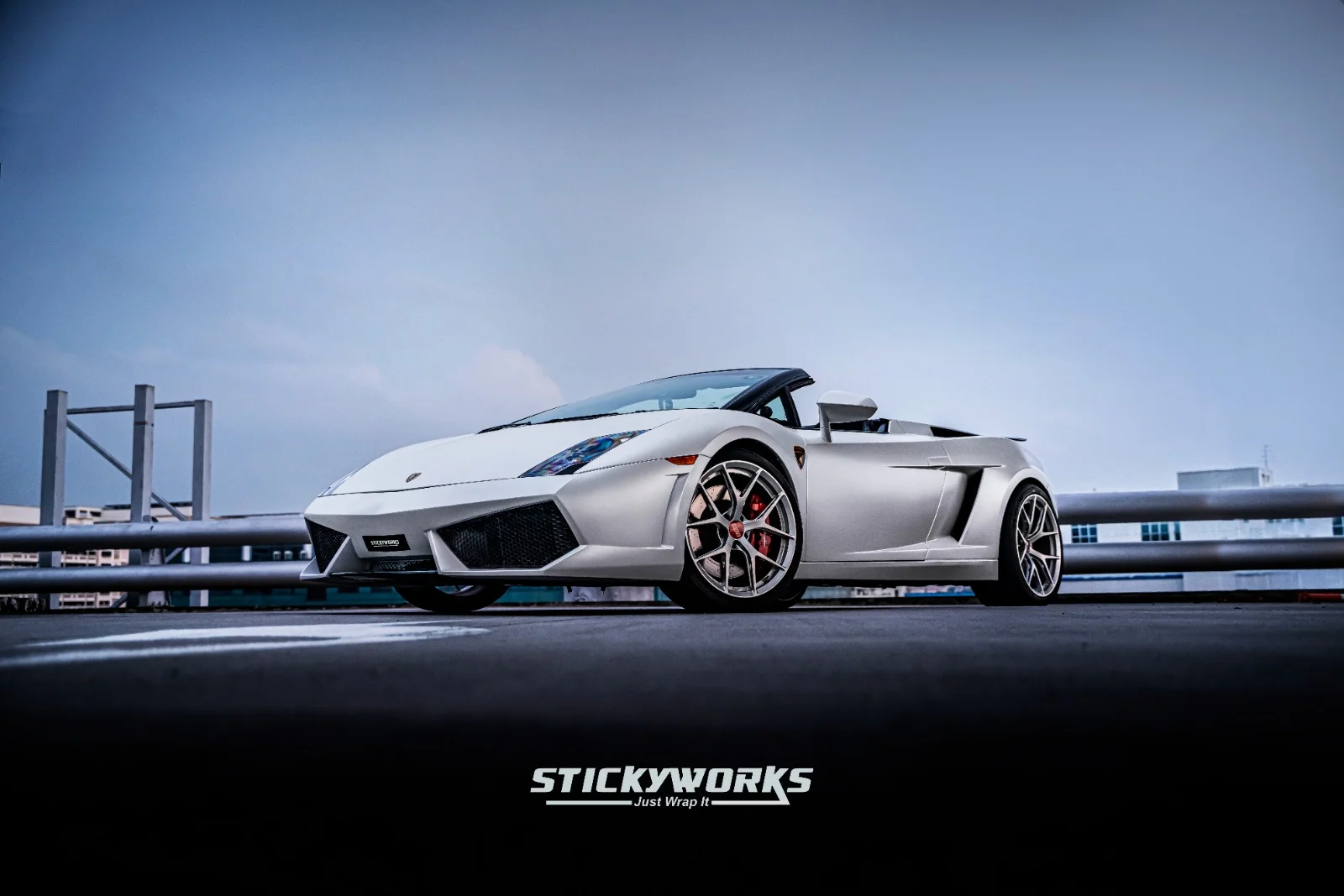 StickyWorks Lamborghini matte white wrap side profile showcasing clean finish and premium luxury styling