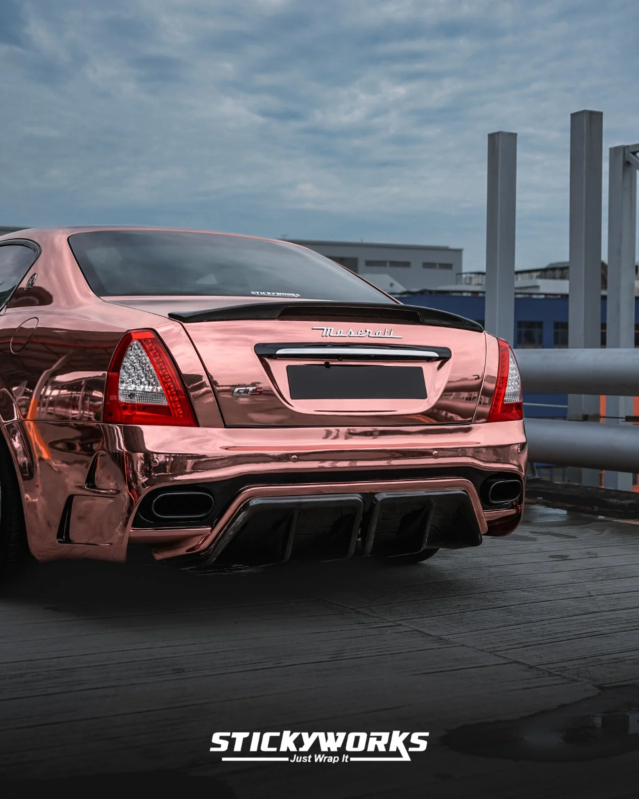 StickyWorks Maserati rear view in chrome wrap highlighting reflective finish and luxury transformation