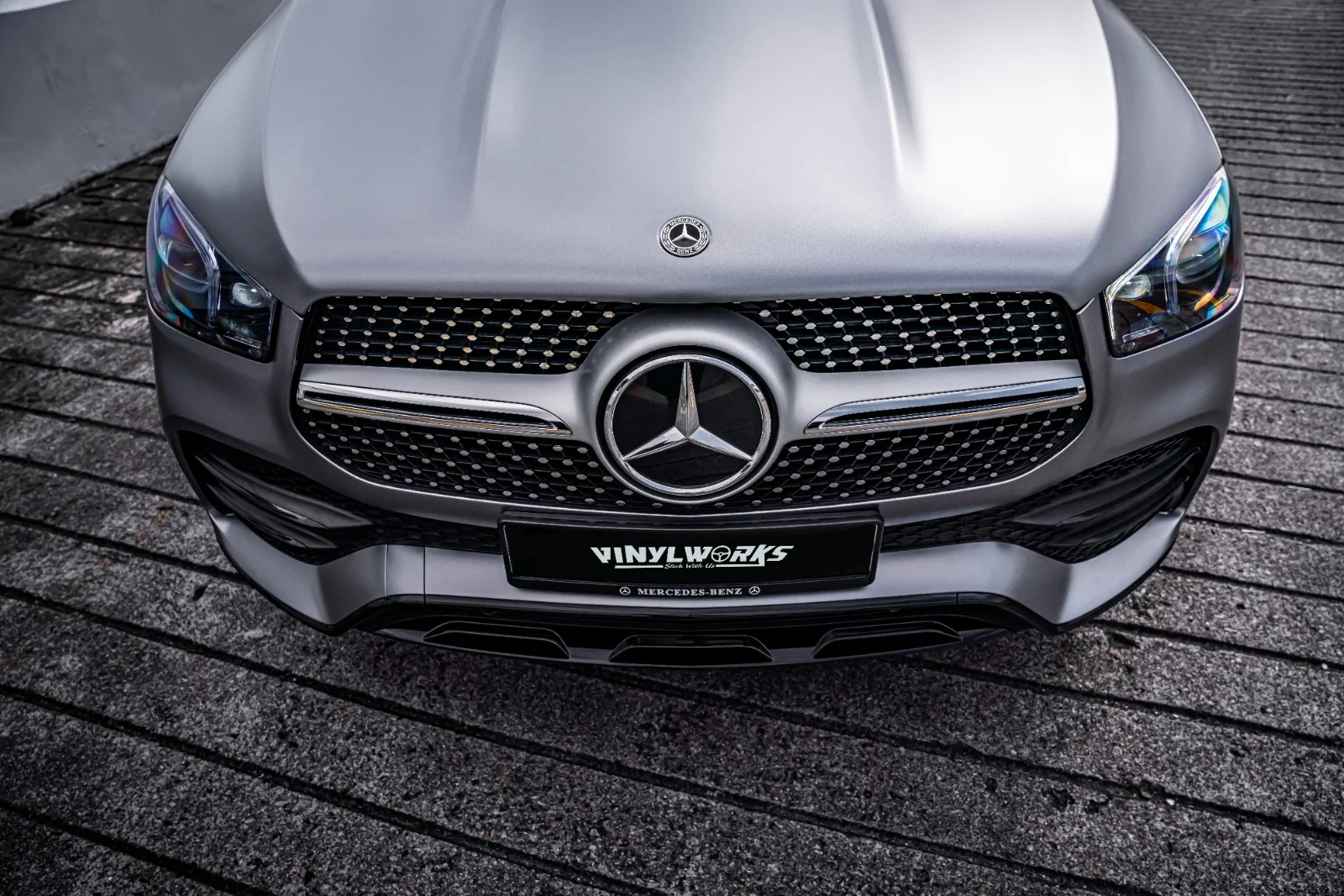 StickyWorks Mercedes SUV front view with satin grey wrap showing clean lines and professional finish