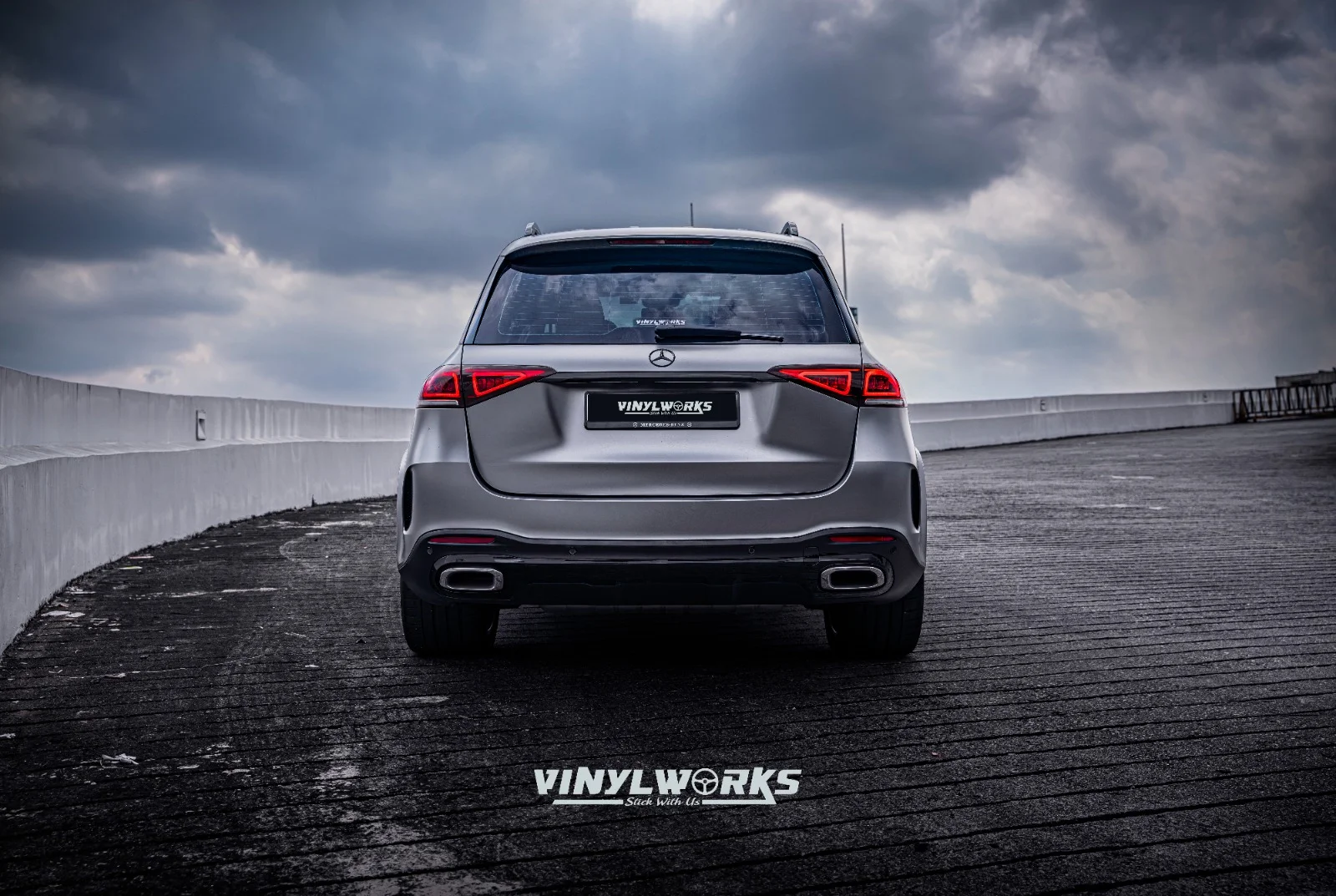 StickyWorks Mercedes SUV rear view in satin grey wrap highlighting clean lines and professional wrap finish