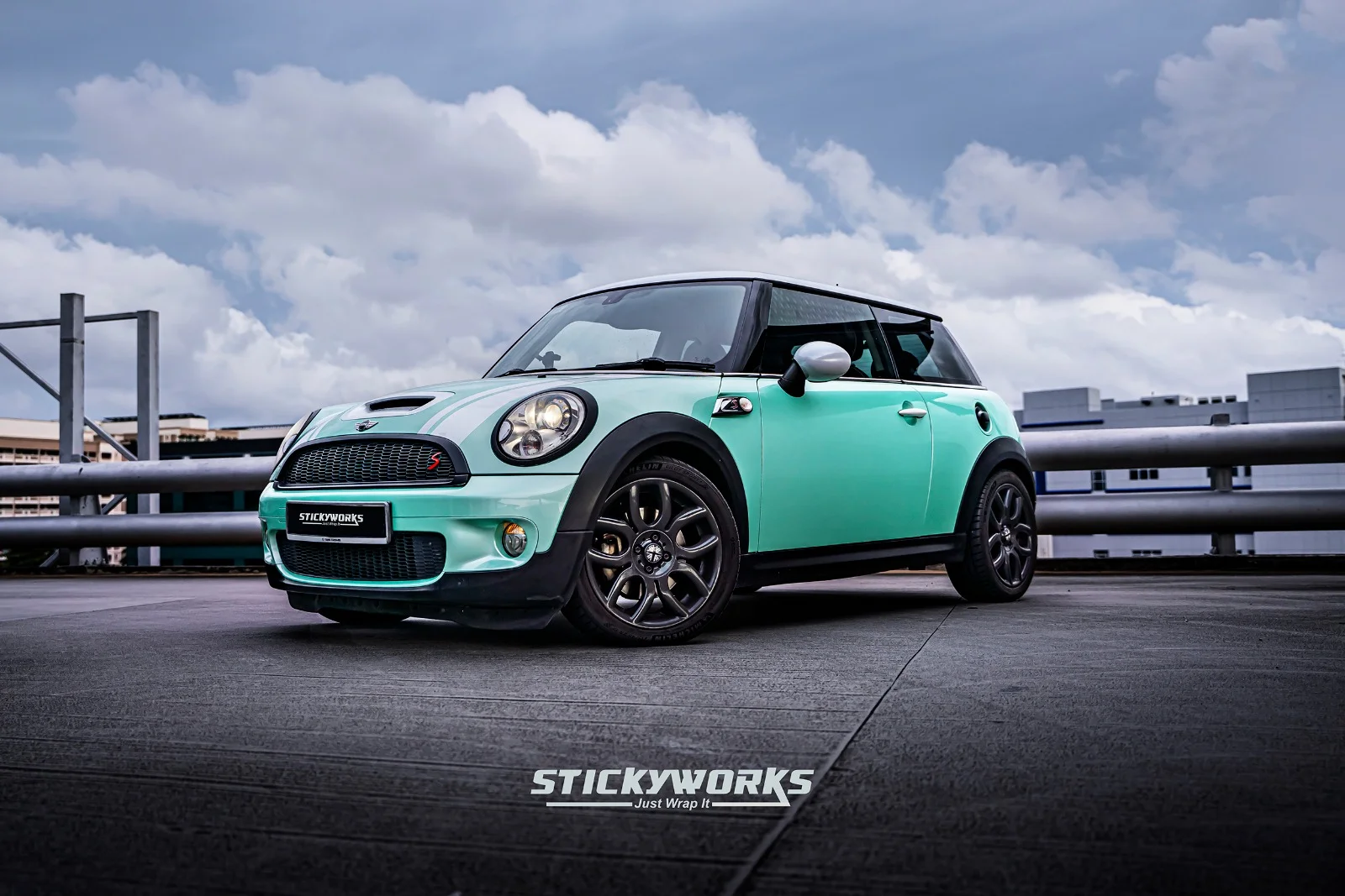 StickyWorks Mini Cooper mint wrap front angle highlighting smooth vinyl application and styling