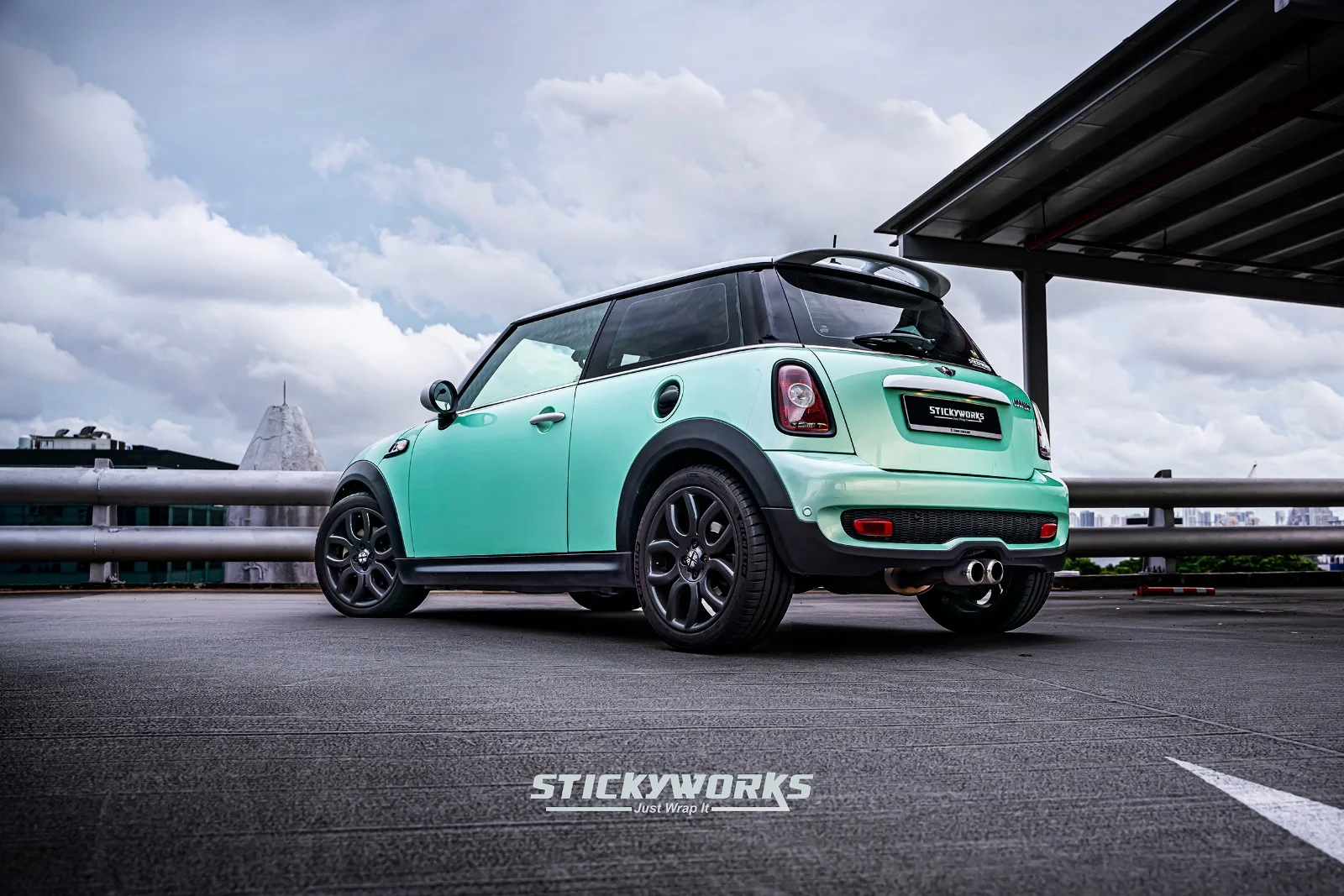 StickyWorks Mini Cooper rear angle with mint wrap demonstrating full coverage and consistent finish