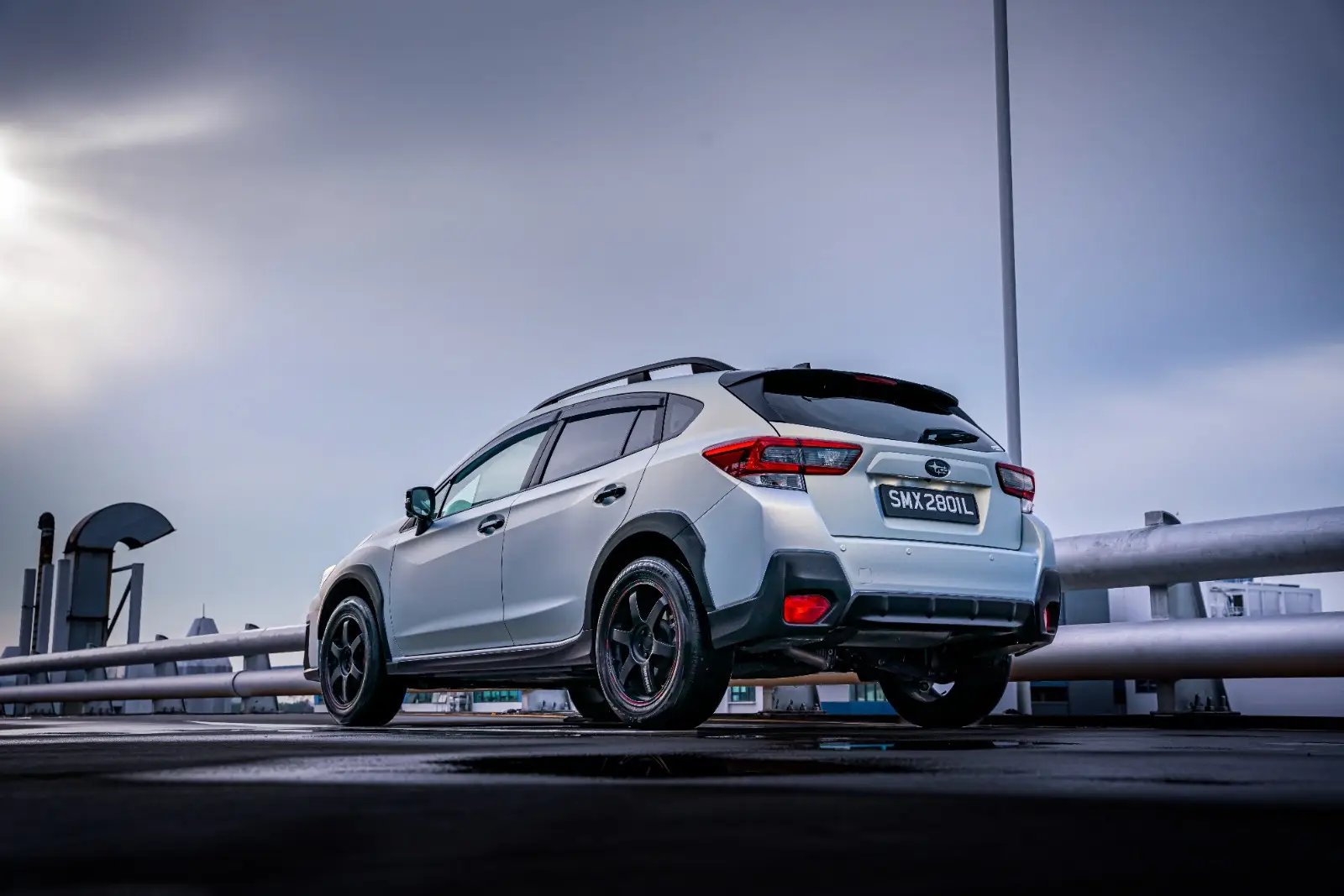 StickyWorks Subaru car wrap rear angle view highlighting smooth glossy vinyl finish